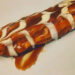 Caramel Eclair $3.50 (#910)